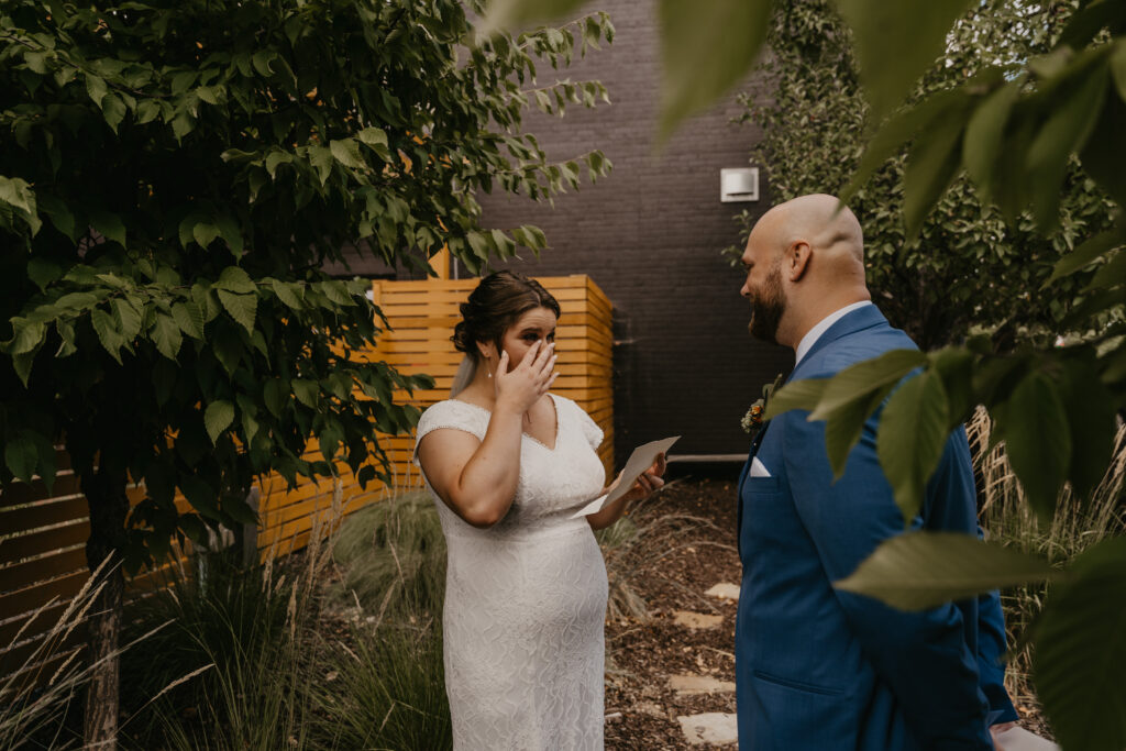 Exchanging private vows before the ceremony.