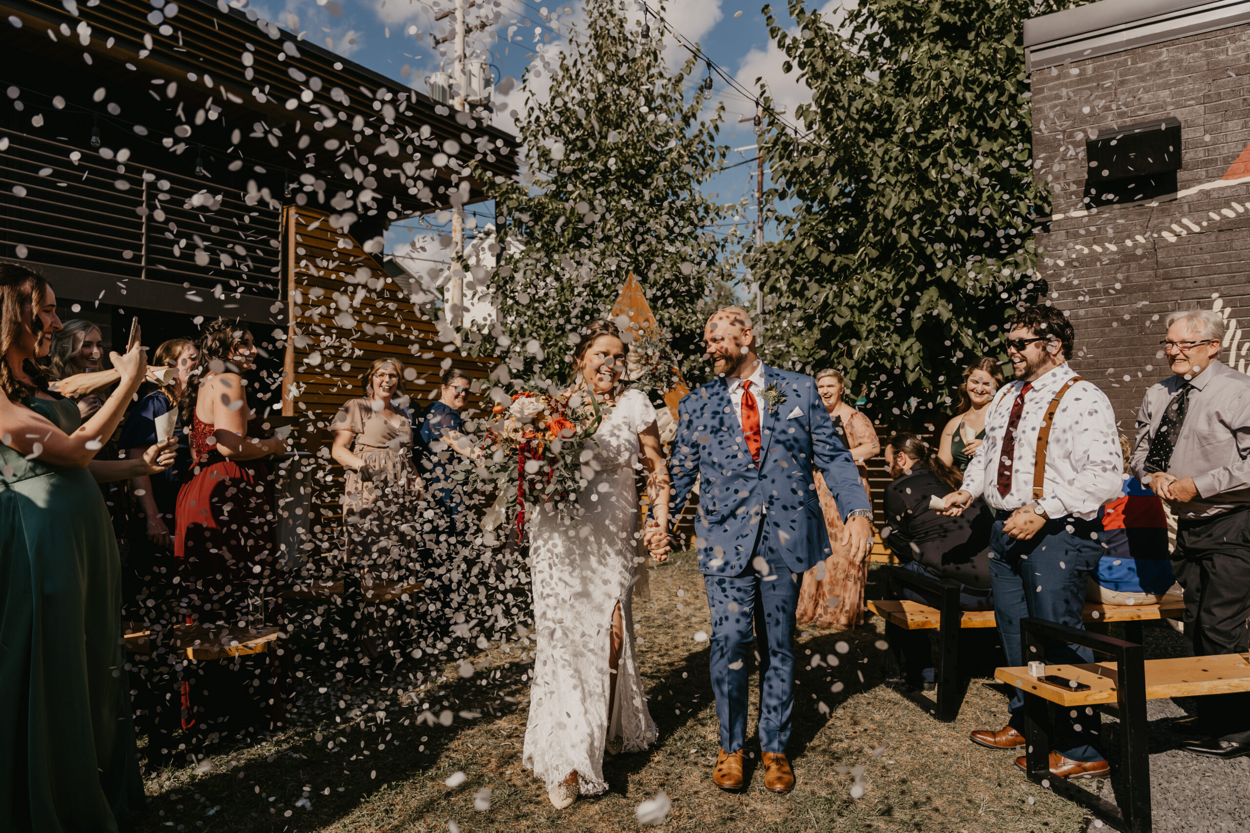 Intimate wedding confetti exit